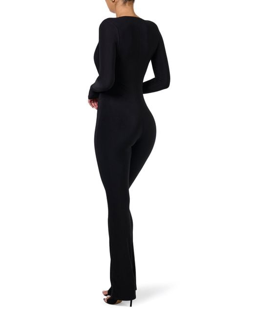 Naked Wardrobe Black Deep V-neck Long Sleeve Jumpsuit
