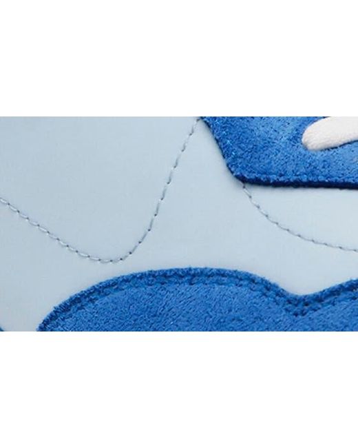 Anne Klein Blue Restless Wedge Sneaker