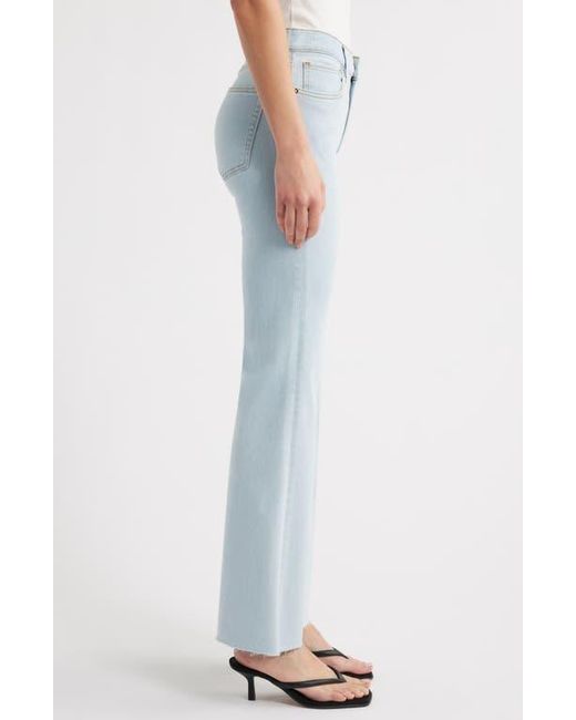 FRAME The Icon Raw Hem Flare Jeans in Blue | Lyst