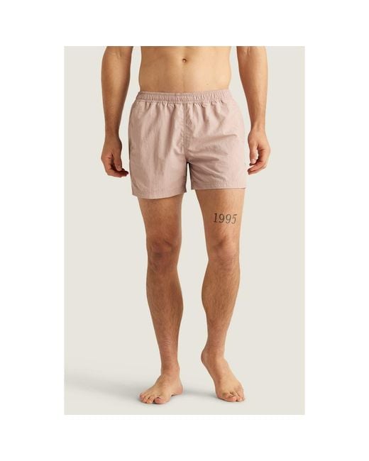 AUTO-REPLY™ Pink Sebastian Solid 4-Inch Nylon Swim Trunks for men