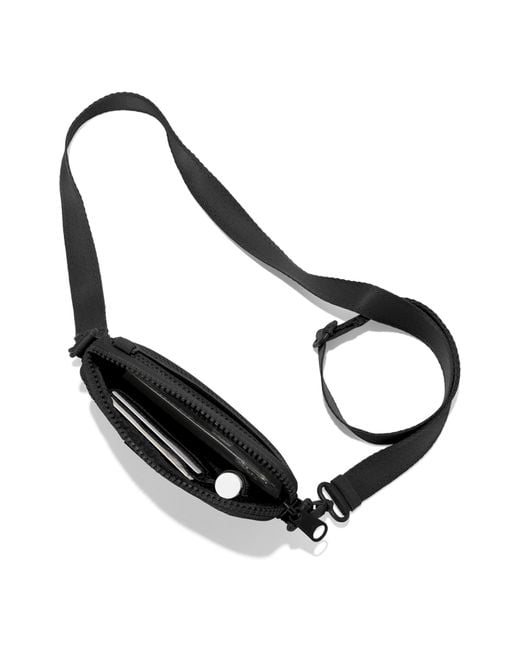 Dagne Dover Mara Water Resistant Phone Sling Crossbody Bag in Black | Lyst
