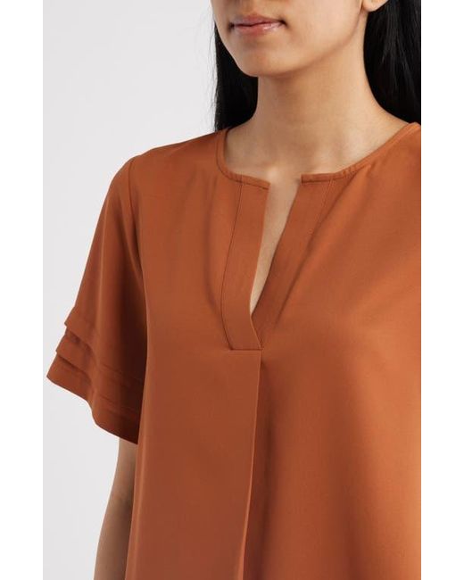Anne Klein Orange Pleated Split Neck Top