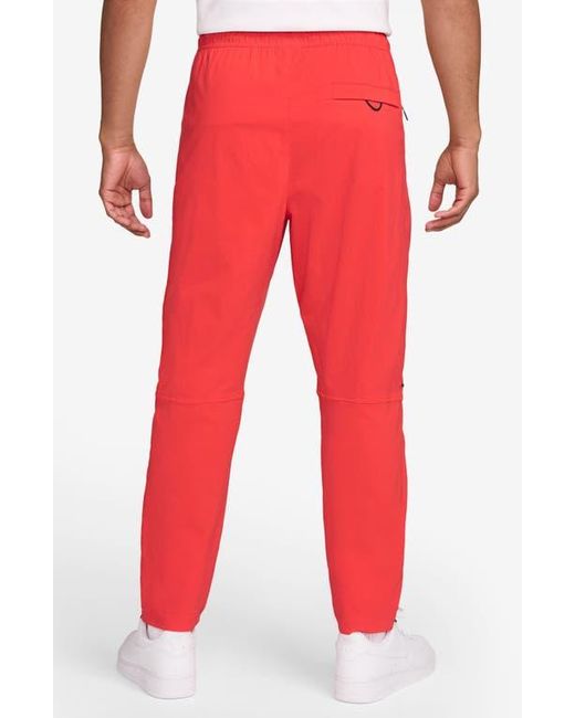 Nike Red Dri-Fit Tech Woven Pants for men