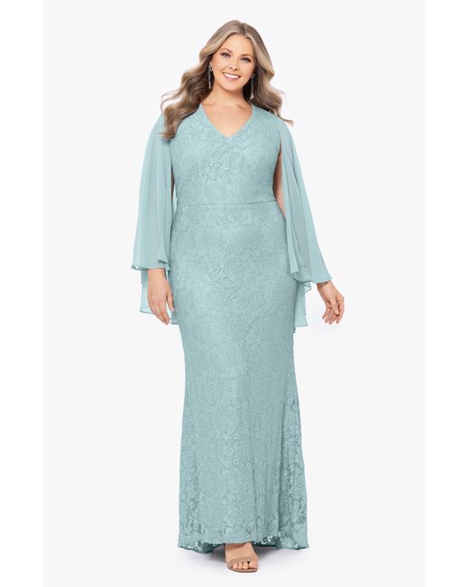 Betsy & Adam Blue Lace Cape Sleeve Gown