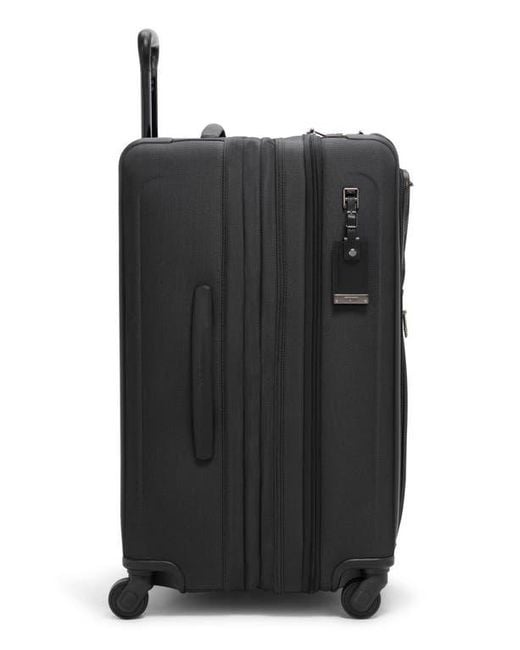 Tumi Alpha 22Inch International Dual Access 4Wheel CarryOn in Black