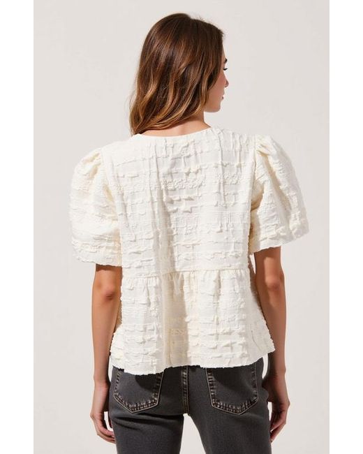 Modenaire White Textured Puff-Sleeve Peplum Blouse With Bow-Tie Front