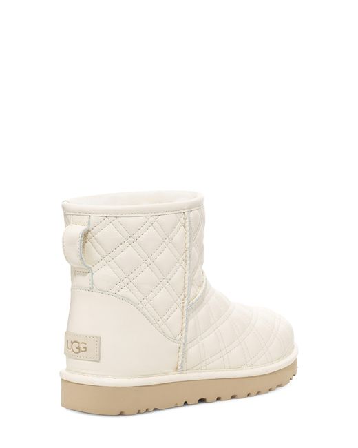 UGG ugg(r) Classic Mini Ii Quilted Genuine Shearling Lined Bootie in White  | Lyst