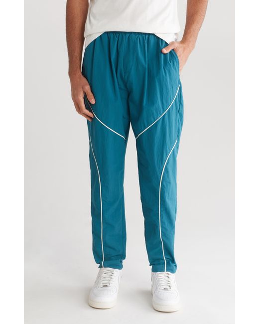 Native Youth Blue Piped Track Joggers for men