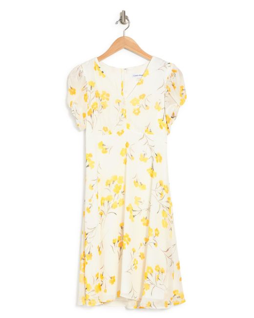Descubrir 55+ imagen calvin klein yellow flower dress Thptnganamst.edu.vn