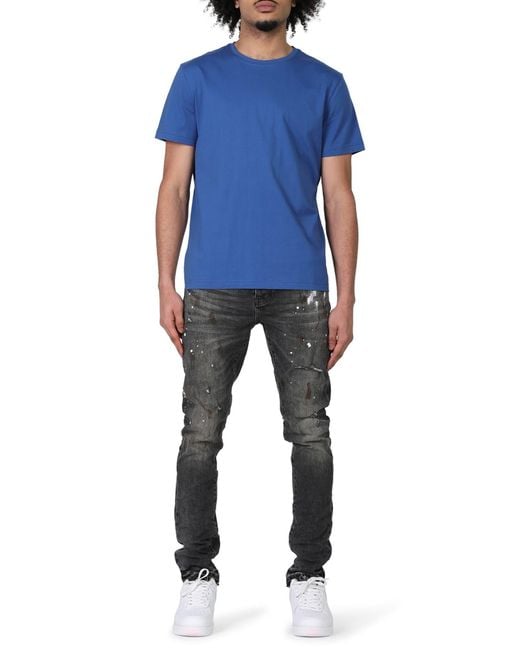 Distressed stretch skinny jeans online