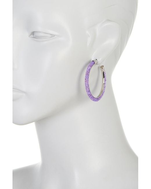 site Onschuldig Kritiek Swarovski Stardust Hoop Earrings in Purple | Lyst