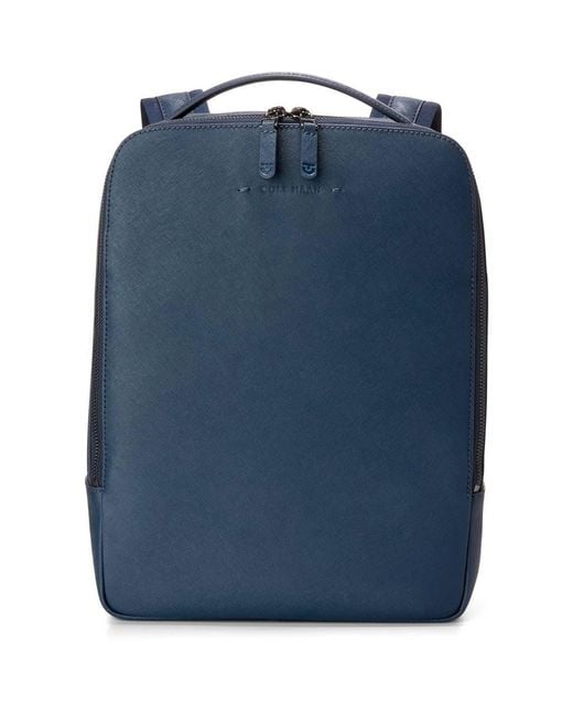 cole haan men's leather flap backpack Damon Smart interior organization and a front zip section streamline storage Cole Haan Sloane Saffiano Leather