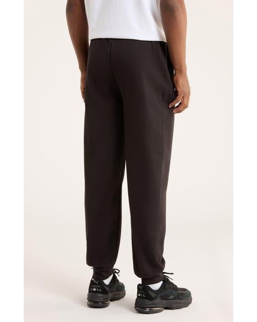 PUMA Black Maximal Metallic Logo Sweatpants for men