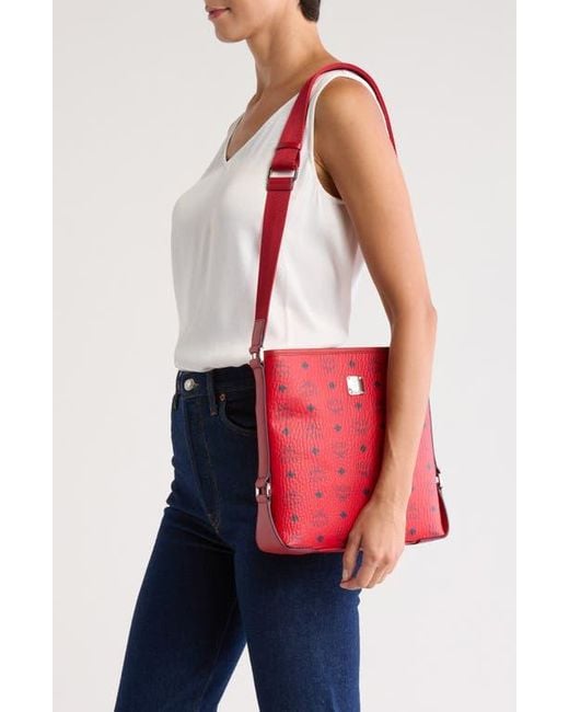 MCM Monogram Leather Crossbody Bag in Red | Lyst