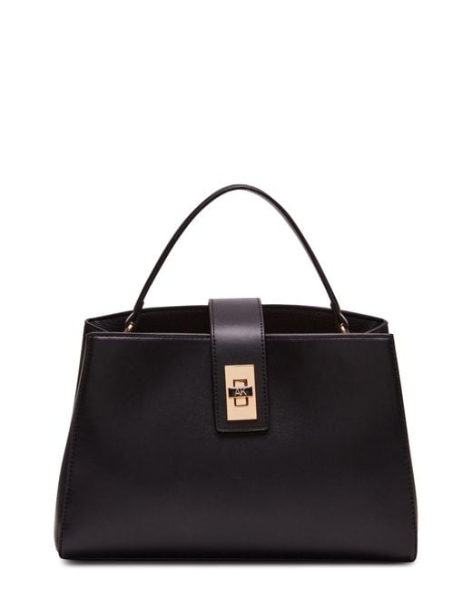 Anne Klein Medium Top Handle Turnlock Bag in Black | Lyst