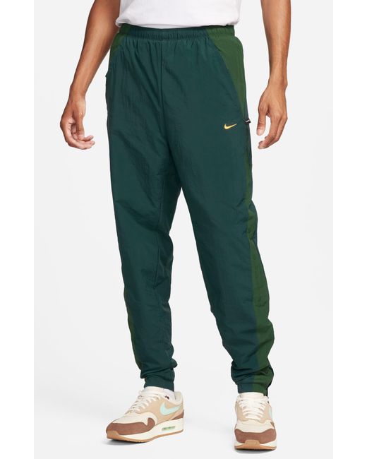 Nike Green Repel Culture Of Football Winter Soccer Pants for men