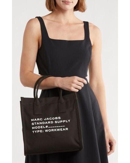marc-jacobs-medium-canvas-standard-supply-tote-in-black-lyst