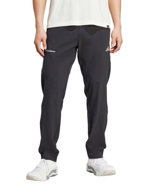 Adidas Blue Train Essentials Pants for men