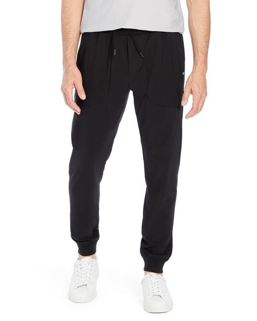 Kenneth Cole Stretch Knit Tech Joggers In Black At Nordstrom Rack for men