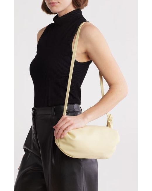 【500円引きクーポン】 BCBGMAXAZRIA Barrel Sling Bag in Natural | Lyst 小物
