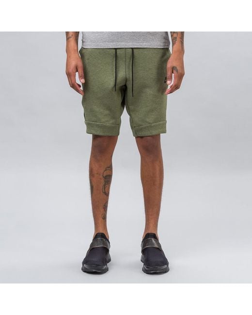 nike tech olive green pants