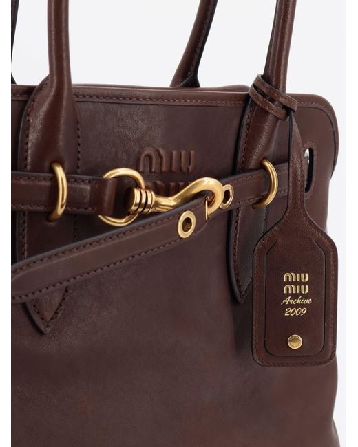 Miu Miu Brown Aventure Leather Handbag With Front Lettering Logo