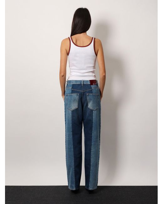 デニム・ジーパン Patchwork denim jeans with gucci rosso ancora Gucci Patchwork Denim Jeans With Rosso Ancora in Blue | Lyst