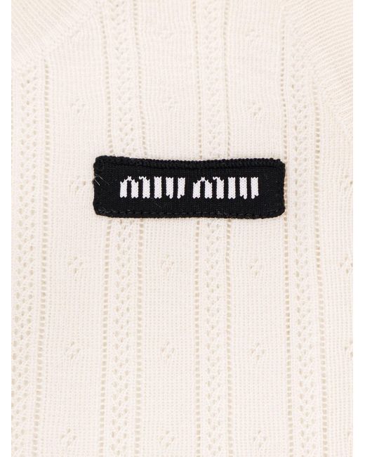 Tシャツ・カットソー MIU MIU Perforated cachemire silk top Bianco Miu Miu Perforated Cachemire And Silk Top in Natural | Lyst