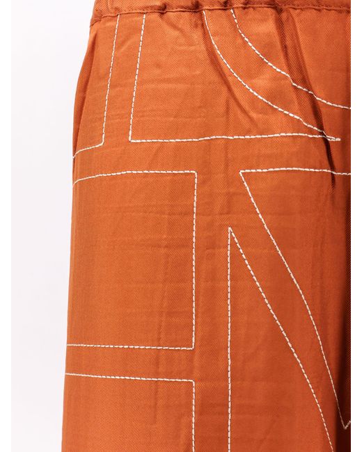 Totême  Orange Silk Trousers With Monogram Logo Embroidery