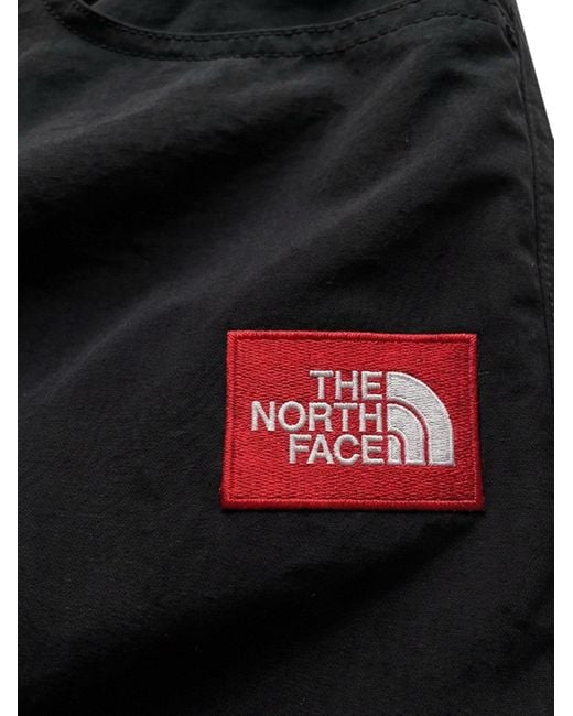 The North Face Blue Nylon Trousers With Front Logo Patch for men