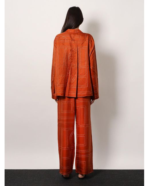 Totême  Orange Silk Trousers With Monogram Logo Embroidery