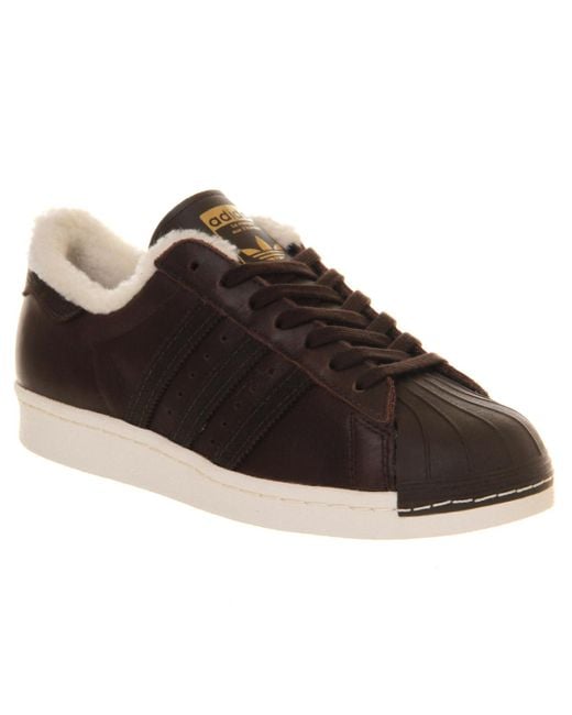brown adidas superstar