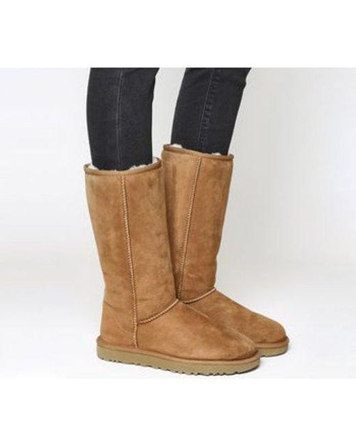 tall flat brown boots