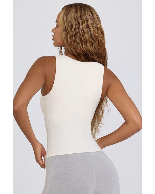 BO+TEE White Soft Active V-Neck Tank Top