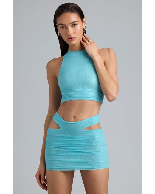Oh Polly Blue Metallic Cut-Out Low-Rise Mini Skirt