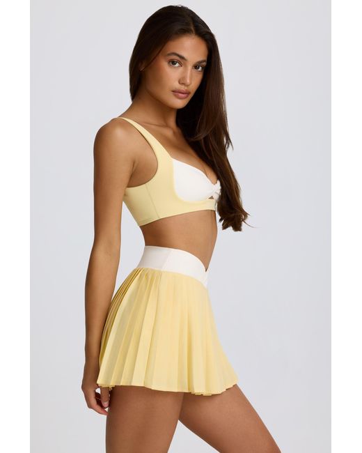 BO+TEE Yellow Soft Active Crossover Pleated Mini Skort