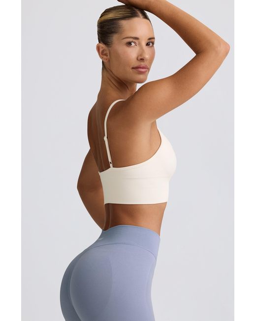 BO+TEE White Define Luxe V-Neck Sports Bra