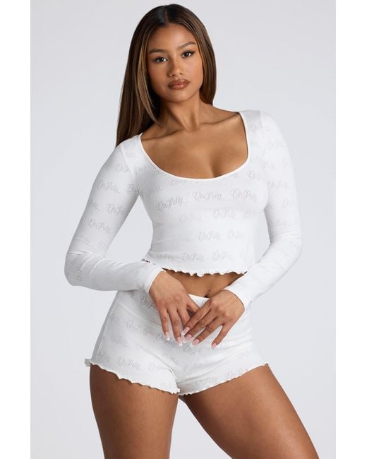 Oh Polly White Mid Rise Pointelle Mini Shorts
