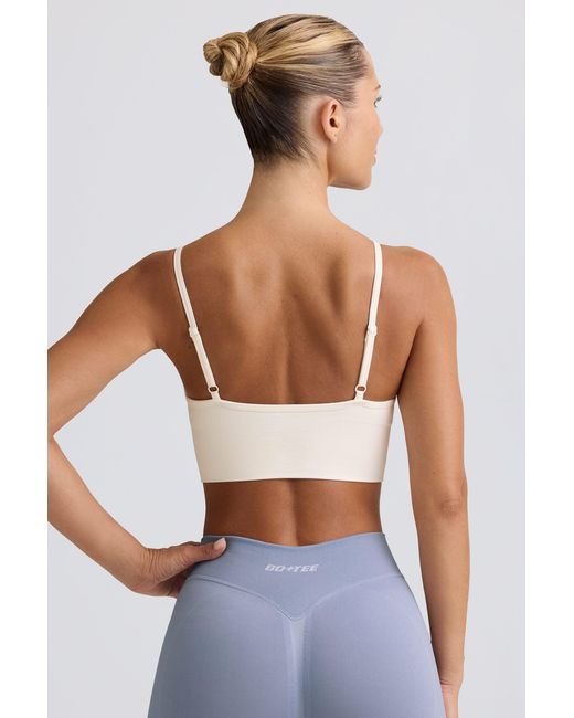 BO+TEE White Define Luxe V-Neck Sports Bra