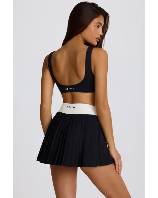 BO+TEE Black Soft Active Crossover Pleated Mini Skort