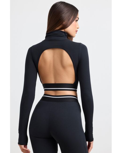 BO+TEE Black Backless Turtleneck Long-Sleeve Crop Top