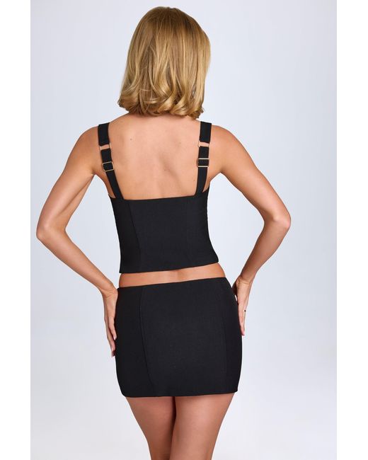 Oh Polly Black Curved Low-Rise Mini Skirt