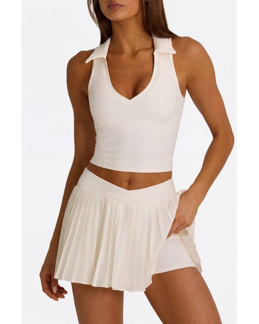 BO+TEE White Soft Active Crossover Pleated Mini Skort