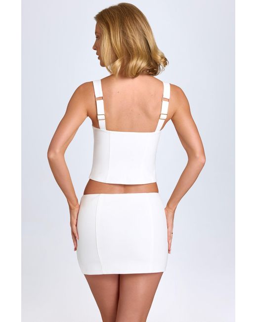 Oh Polly White Curved Low-Rise Mini Skirt