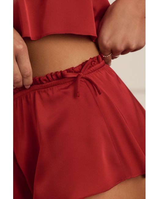 Oh Polly Mid-Rise Flared Shorts