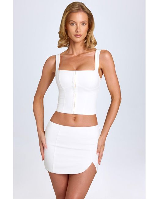 Oh Polly White Curved Low-Rise Mini Skirt