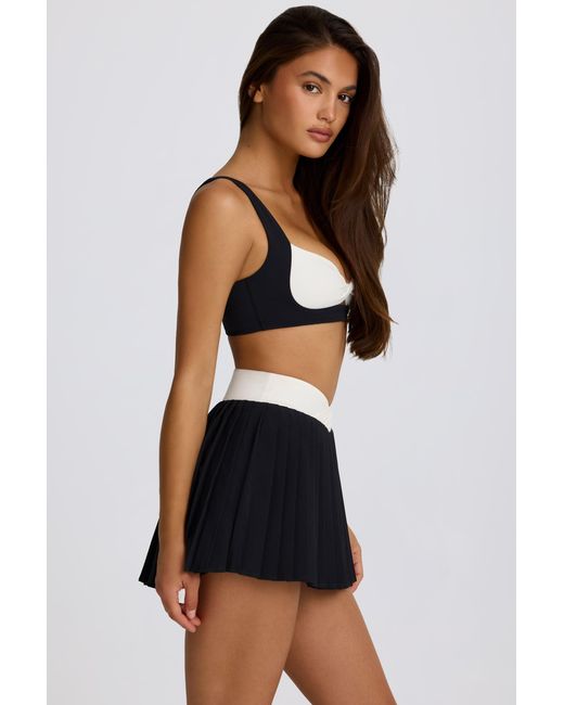 BO+TEE Black Soft Active Crossover Pleated Mini Skort