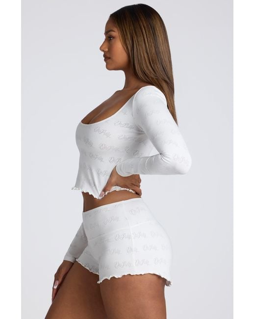 Oh Polly White Mid Rise Pointelle Mini Shorts