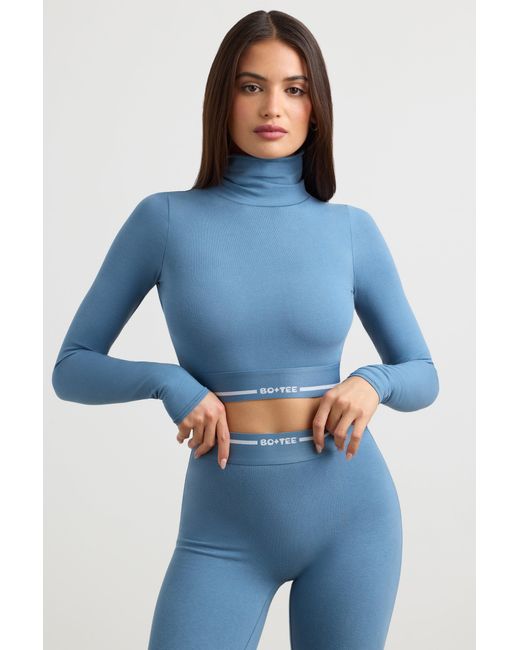 BO+TEE Blue Backless Turtleneck Long-Sleeve Crop Top