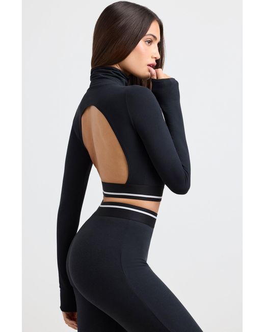 BO+TEE Black Backless Turtleneck Long-Sleeve Crop Top